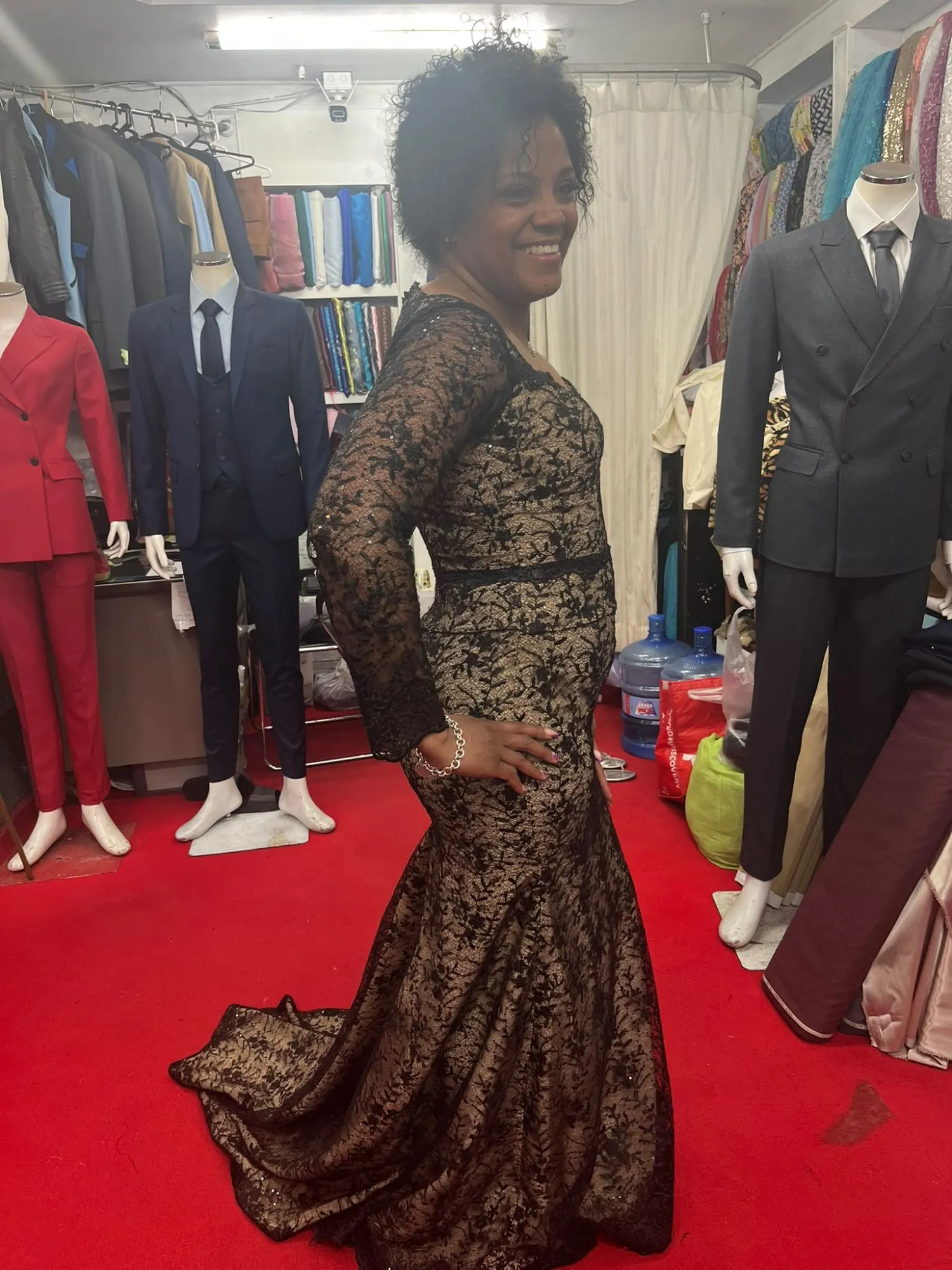 Customer trying on a custom garment at Oslo Tailor