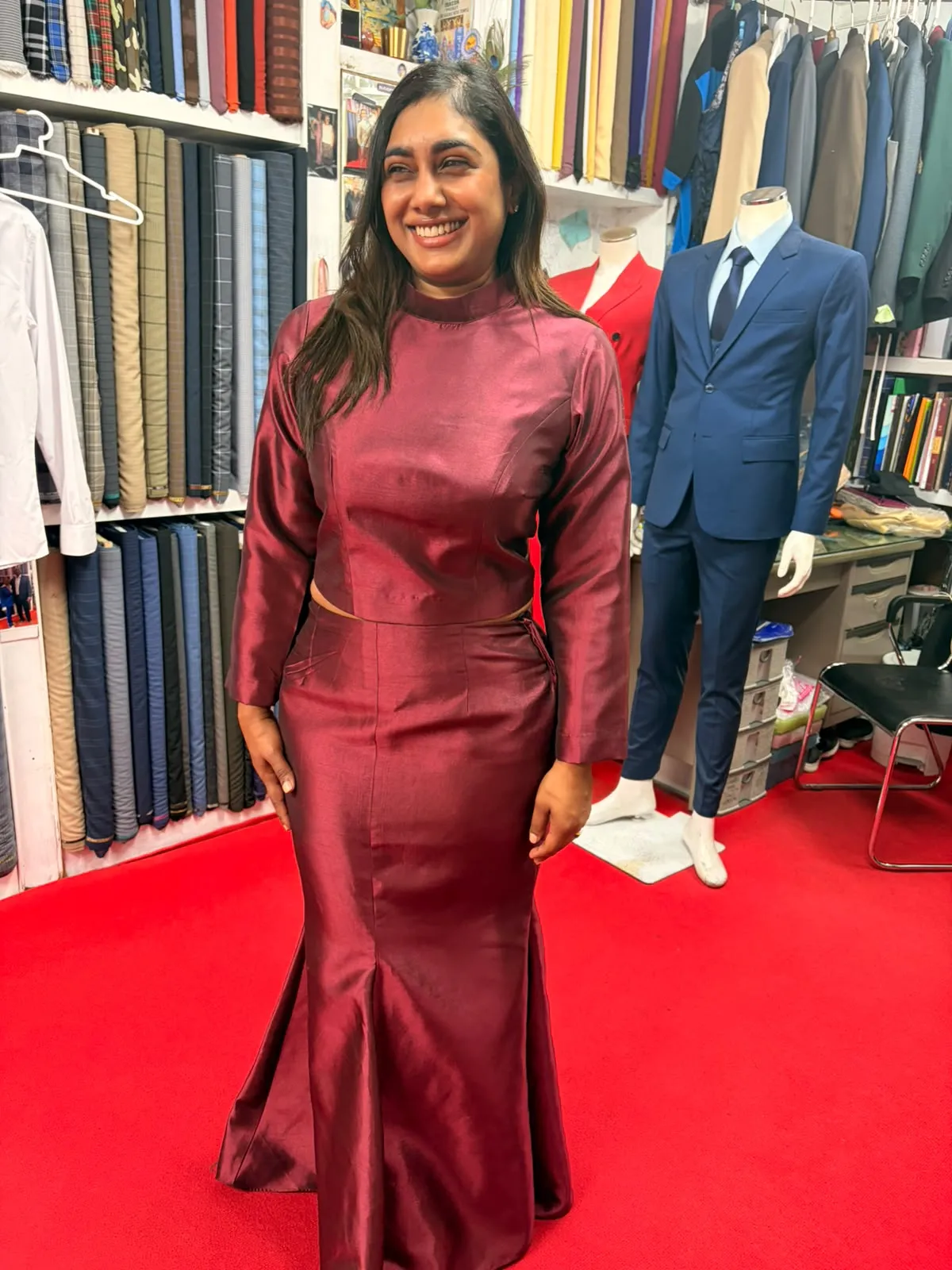 Customer trying on a custom garment at Oslo Tailor
