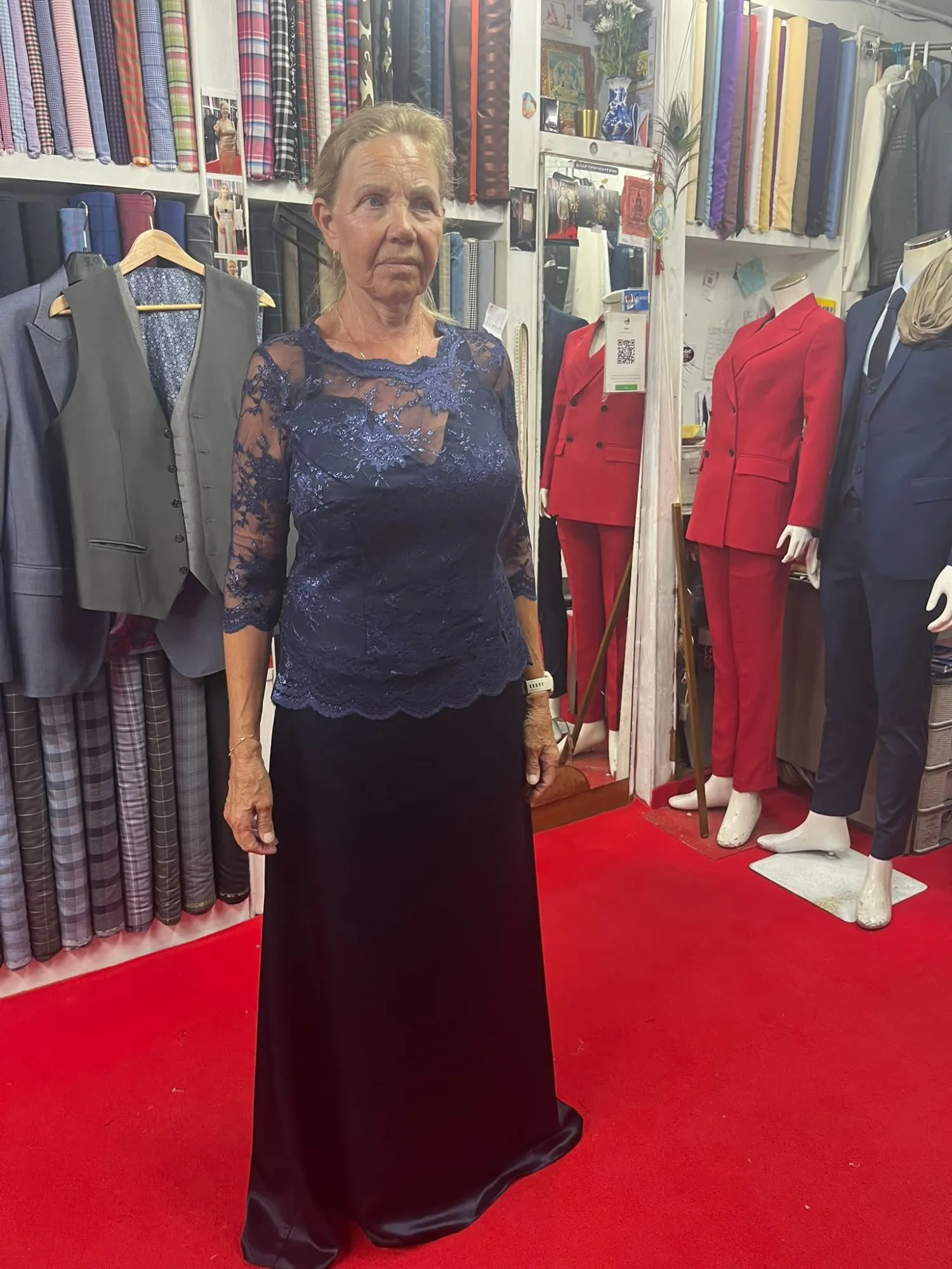 Customer trying on a custom garment at Oslo Tailor